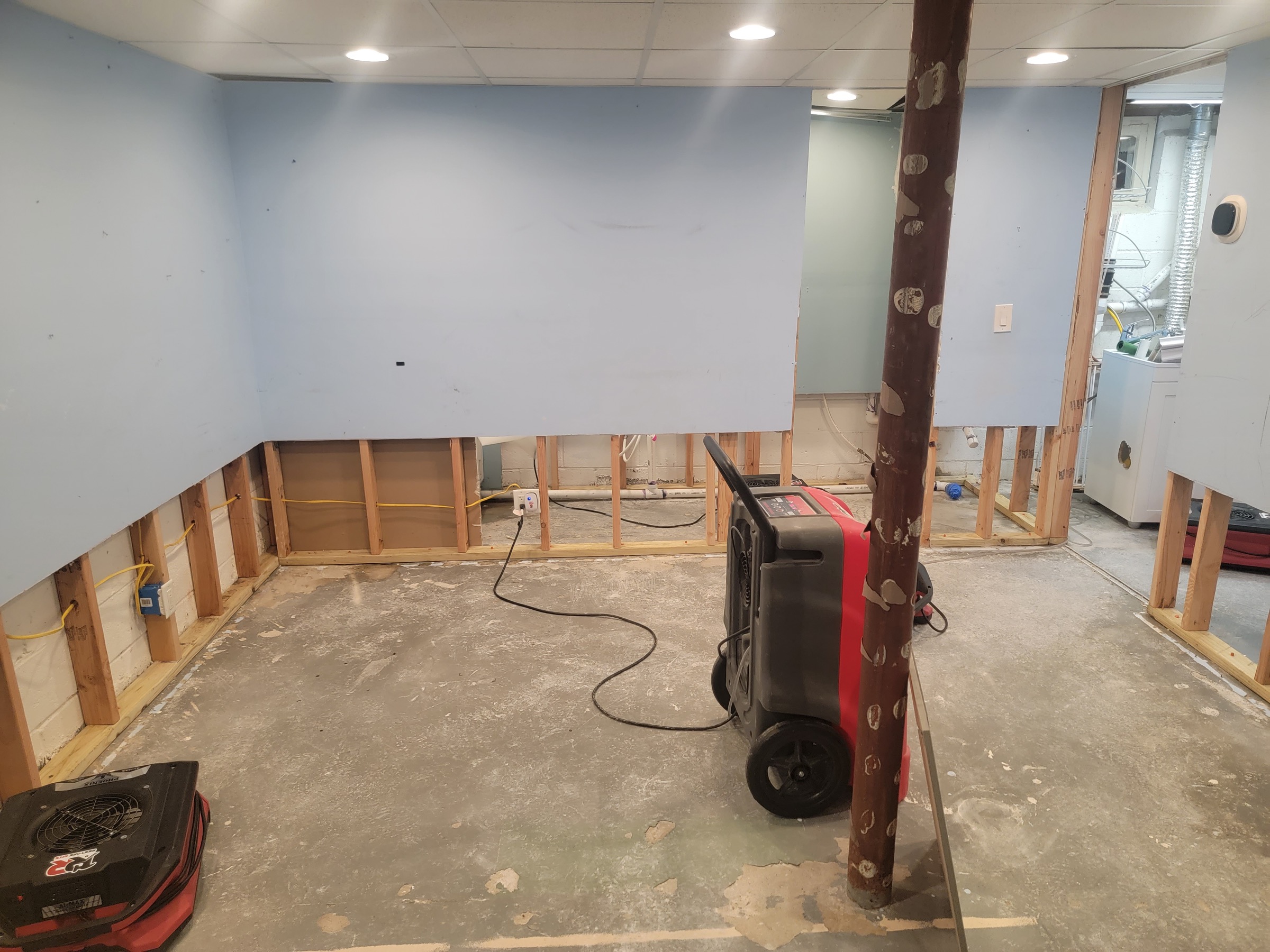 Basement reconstruction in progress with flood cuts complete and drying equipment removed at a Tri-State property